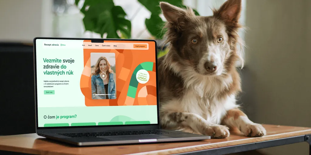 The Zhiva “Recept zdravia” (recipe for health) website on a laptop, next to a dog lying on the table