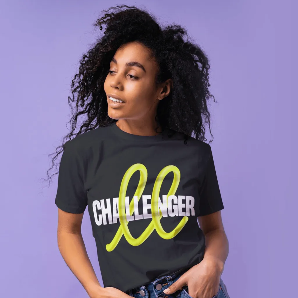 A woman in a black Challenger T-shirt against a lilac background